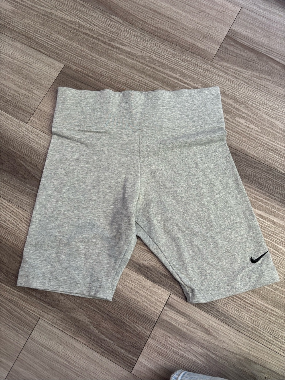 Nike Gray Athletic Shorts with Black Swoosh Logo